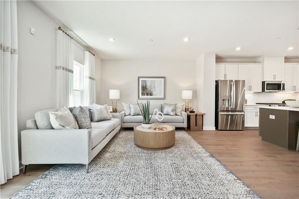 130 Goldenthread Way Coraopolis, PA 15108 - Photo 8 of 27 a living room with furniture and a rug