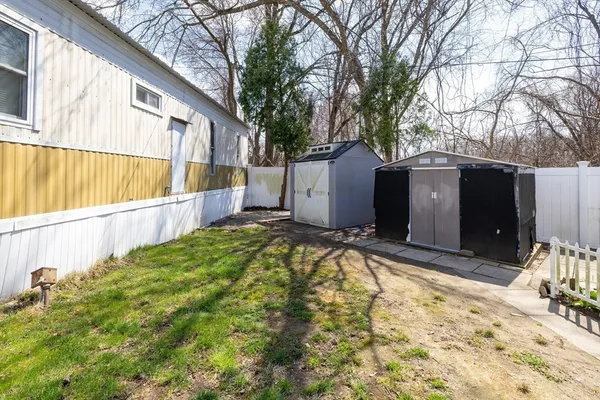 a view of backyard of house