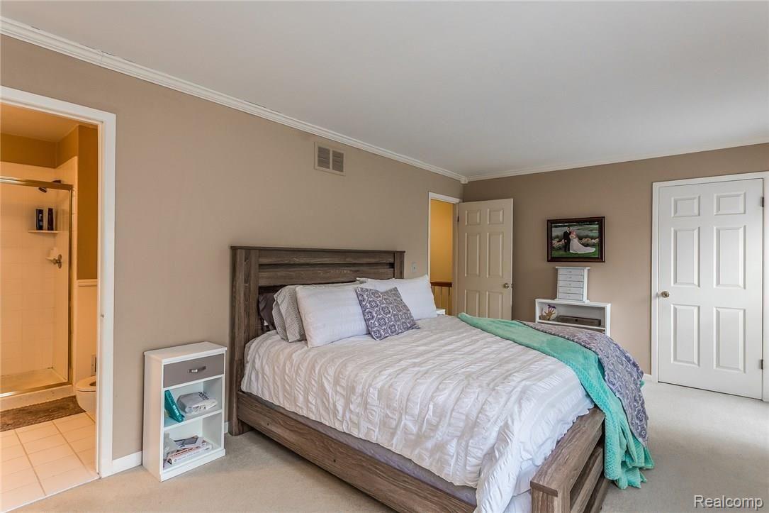 1317 Wagon Wheel Lane Rochester, MI 48306 - Photo 15 of 26 Master bedroom with master bath