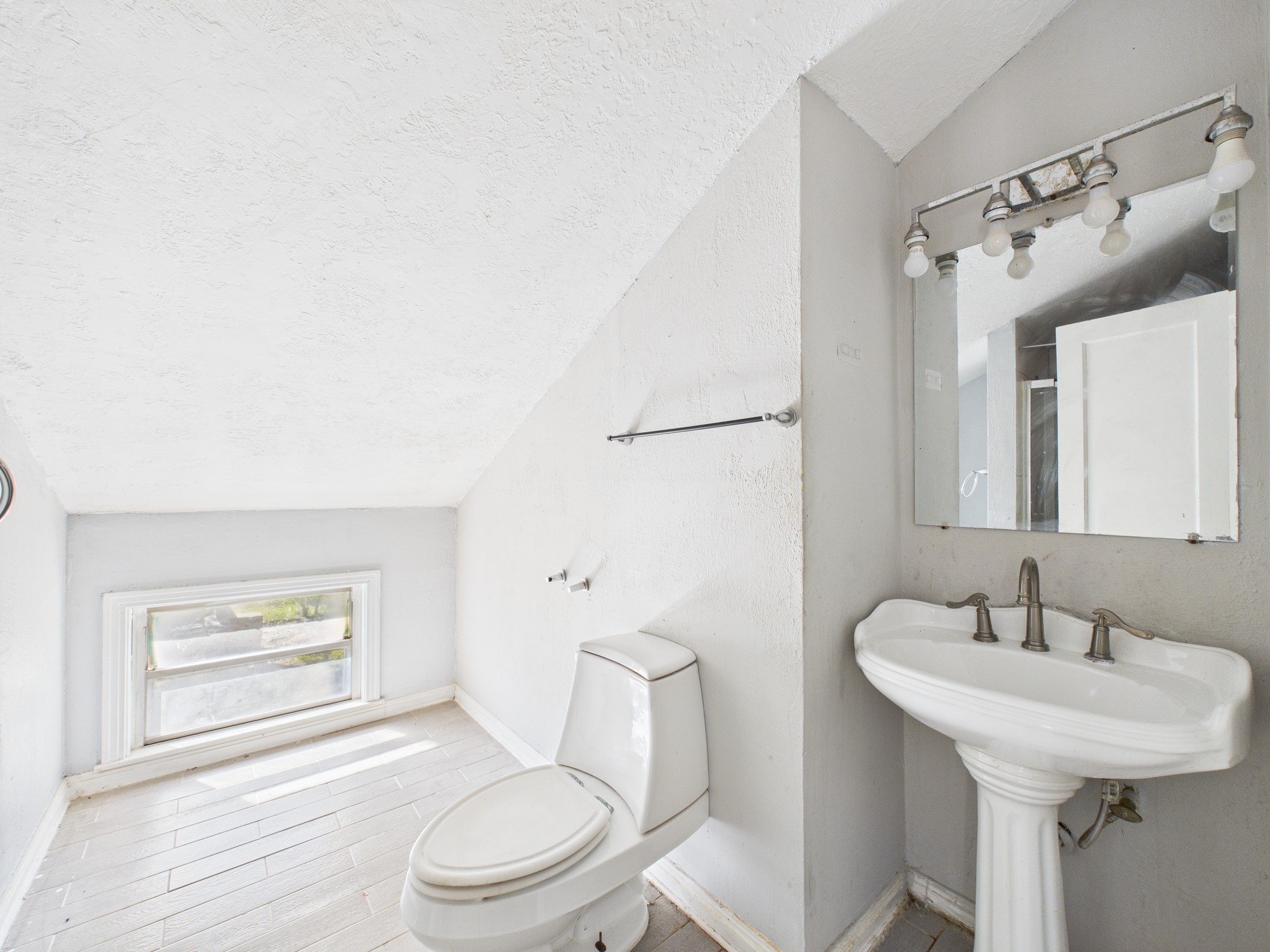 3814 Luca Street Houston, TX 77021 - Photo 21 of 31 a bathroom with a sink a toilet and shower