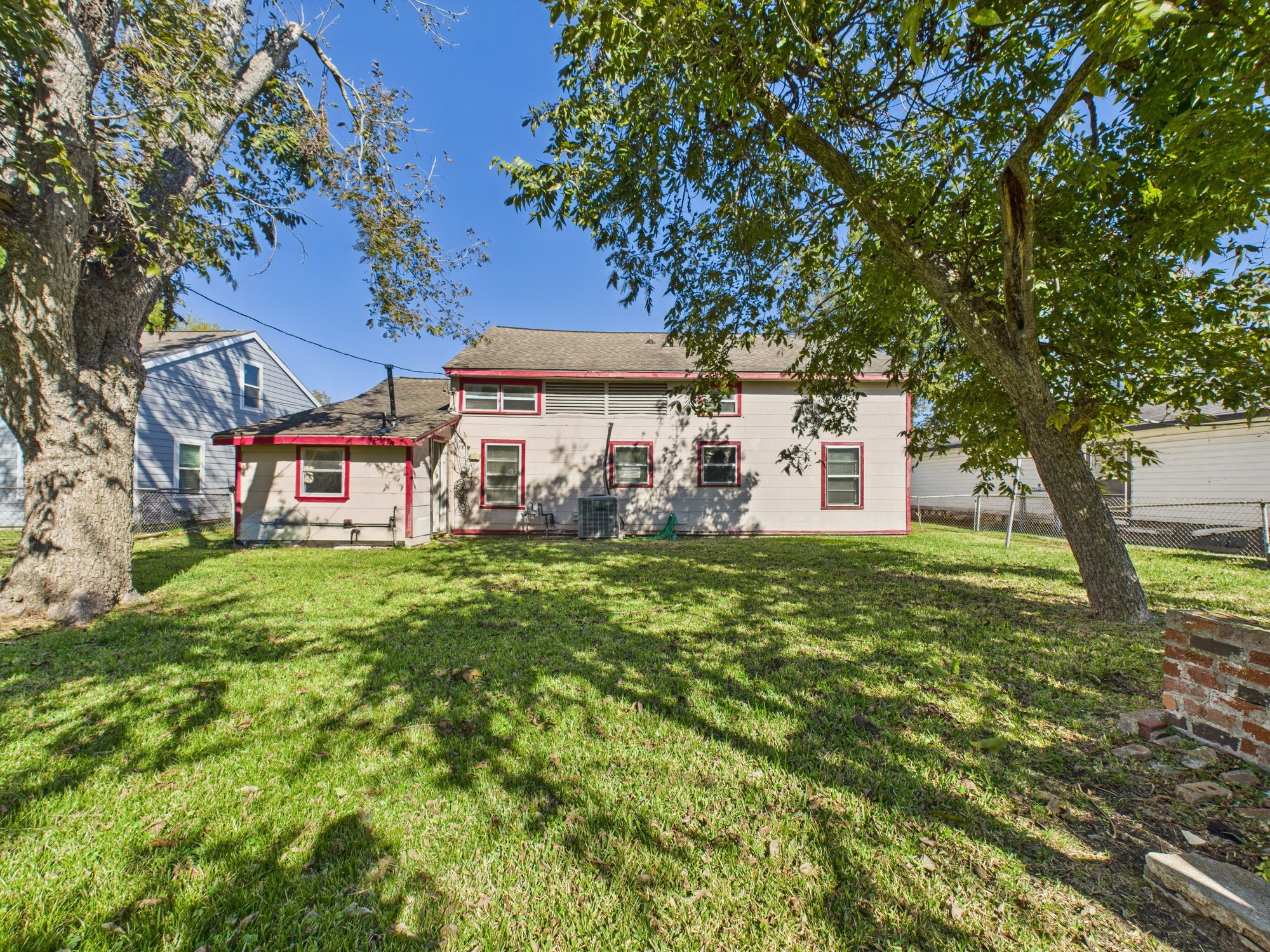 3814 Luca Street Houston, TX 77021 - Photo 28 of 31 a view of a house with a big yard plants and large trees