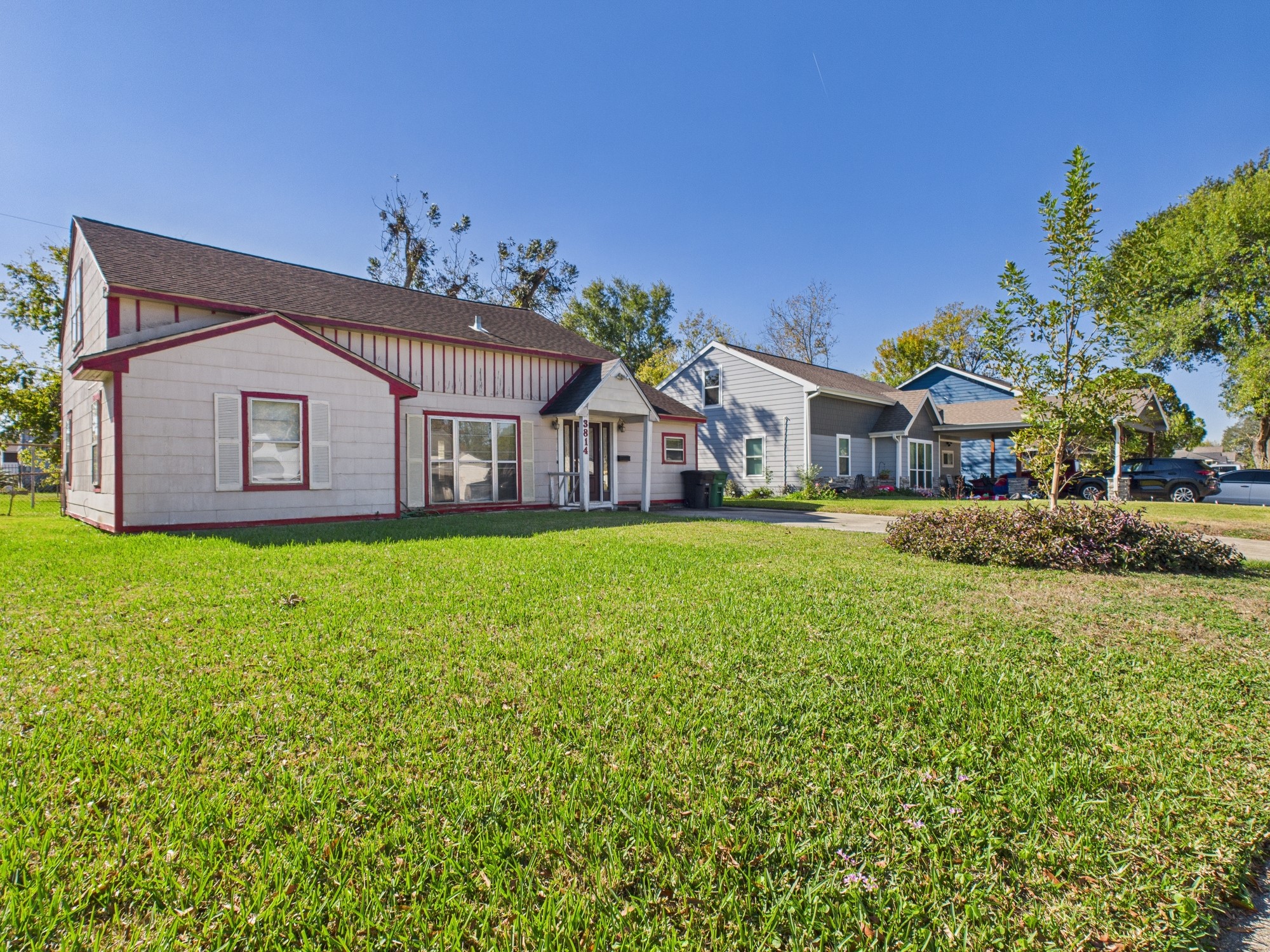 3814 Luca Street Houston, TX 77021 - Photo 30 of 31 a view of a house with a small yard and wooden fence
