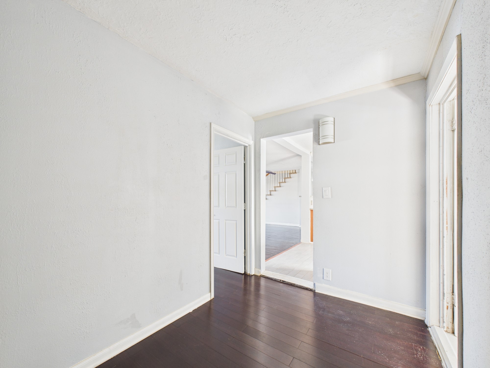3814 Luca Street Houston, TX 77021 - Photo 9 of 31 a view of an empty room with wooden floor