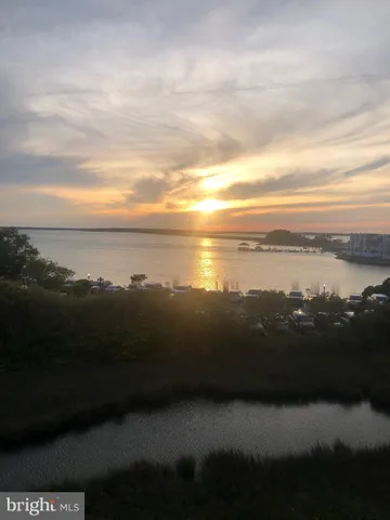 a view of lake with mountain