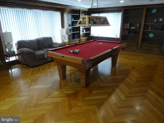 a view of livingroom with furniture and a flat screen tv