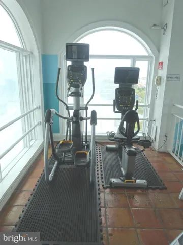 a view of swimming pool with outdoor seating