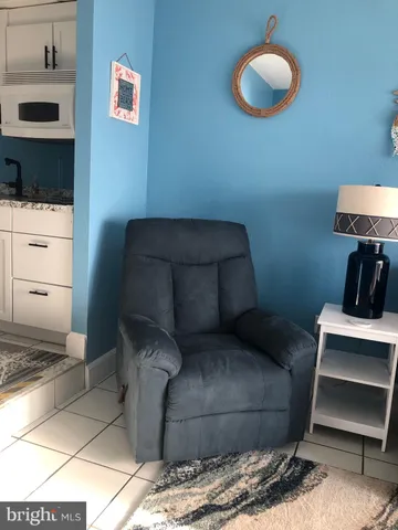 a view of a chairs and table in the patio