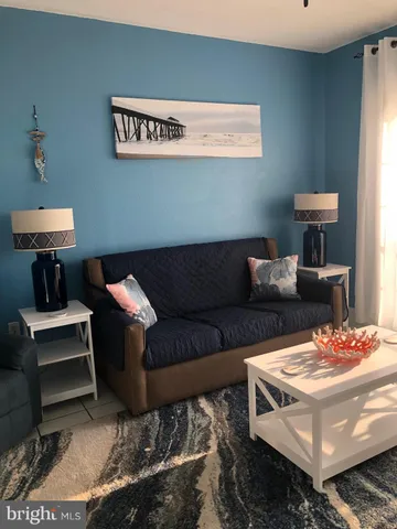 a view of a lake with a yard and lake view