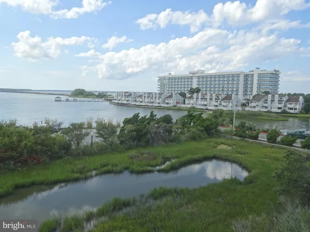 a kitchen with a sink and a stove top oven