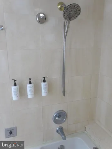 a room with a furniture and a flat screen tv