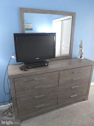 a view of a workspace with furniture