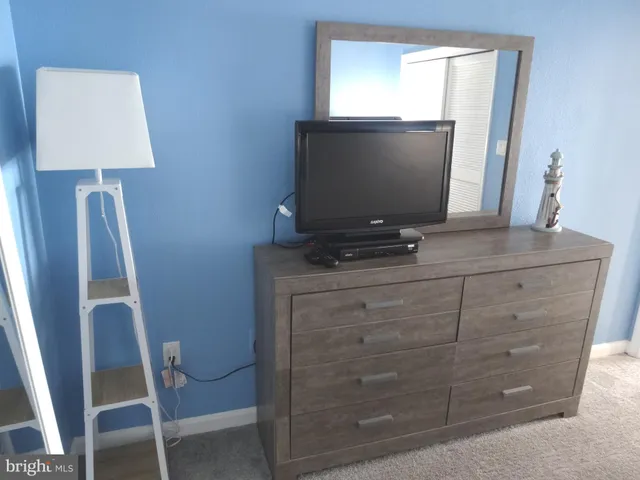 a view of a workspace with furniture