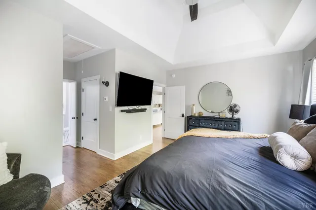 a bathroom with a double vanity sink mirror and toilet