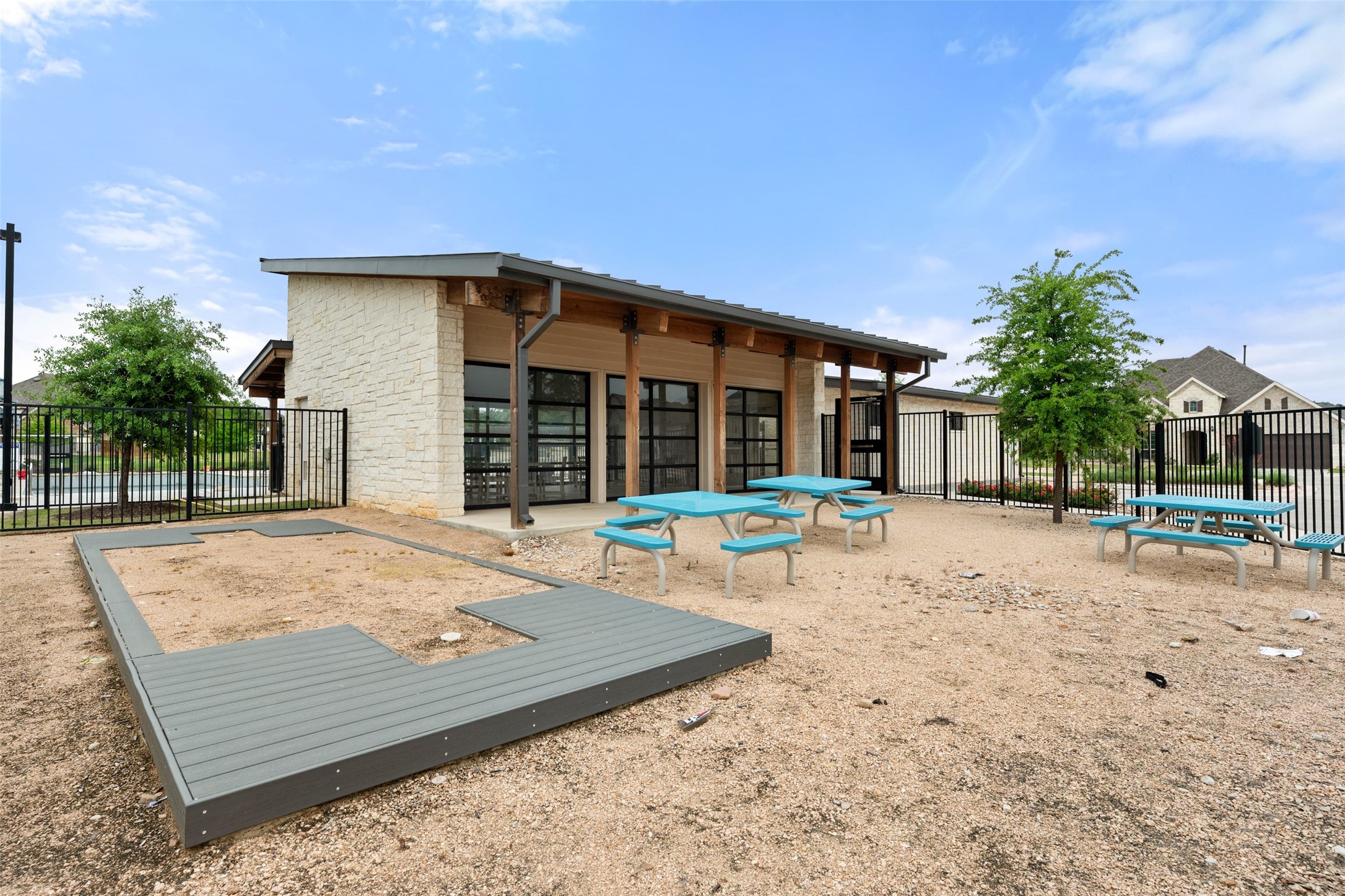 1513 Hinterwald Street Leander, TX 78641 - Photo 39 of 40 a view of a house with backyard and sitting area