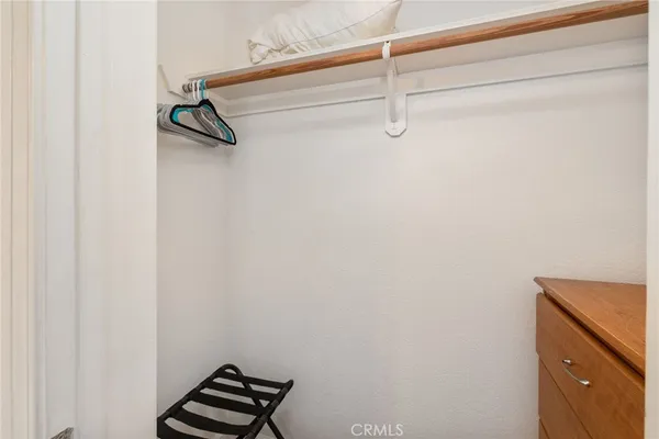 a view of a room with rack on the wall