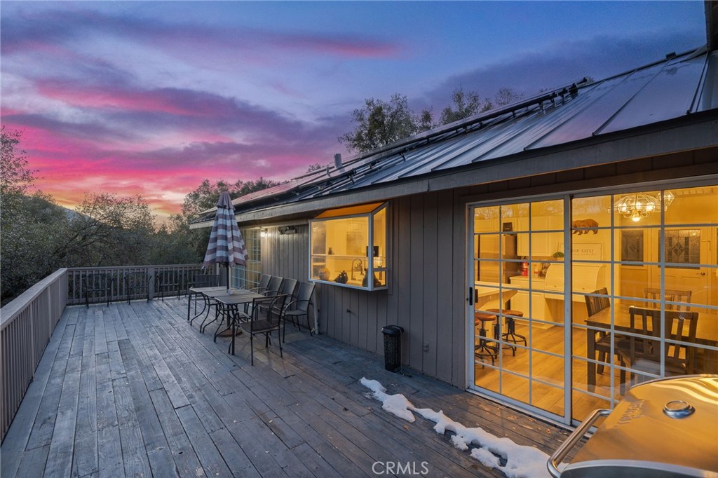 39301 Moonray Lane Oakhurst, CA 93644 - Photo 4 of 55 a view of a chairs and table in patio