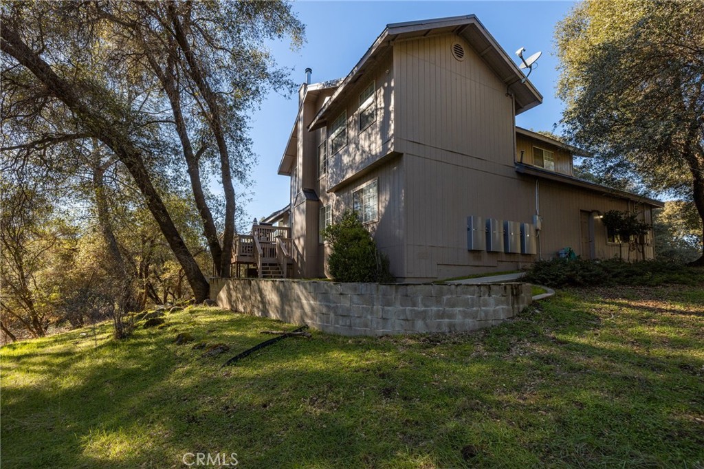 39301 Moonray Lane Oakhurst, CA 93644 - Photo 50 of 55 a view of backyard of house