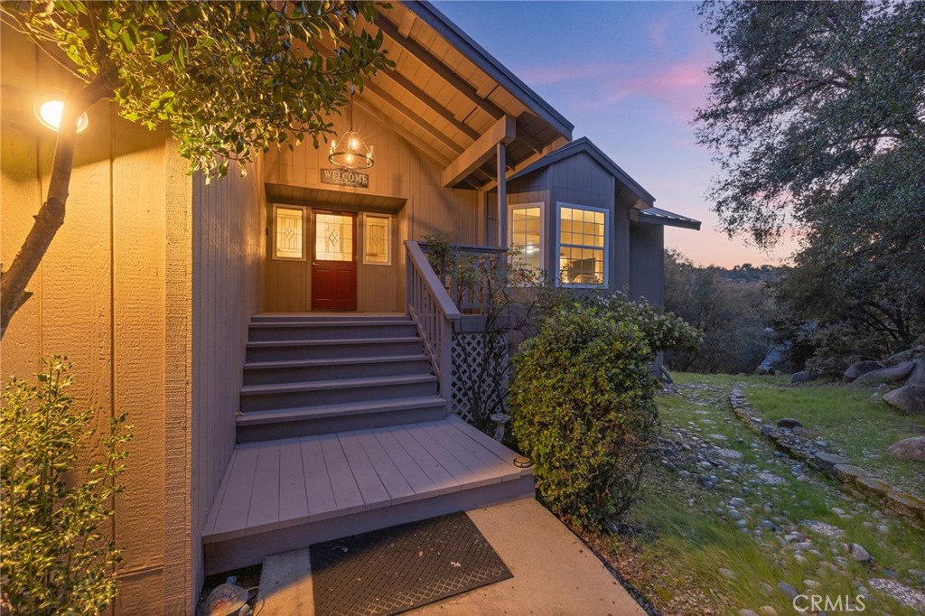 39301 Moonray Lane Oakhurst, CA 93644 - Photo 8 of 55 a view of a house with a yard