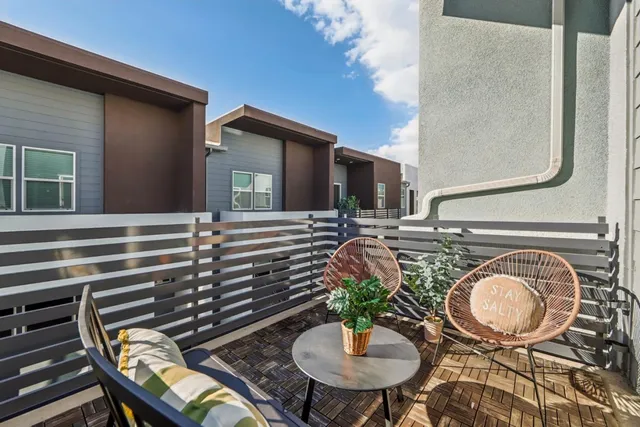 a dining room with furniture and a table