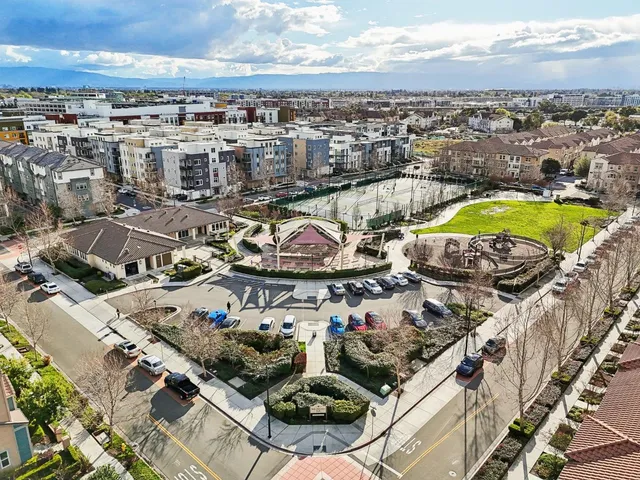 an aerial view of a house with a ocean view