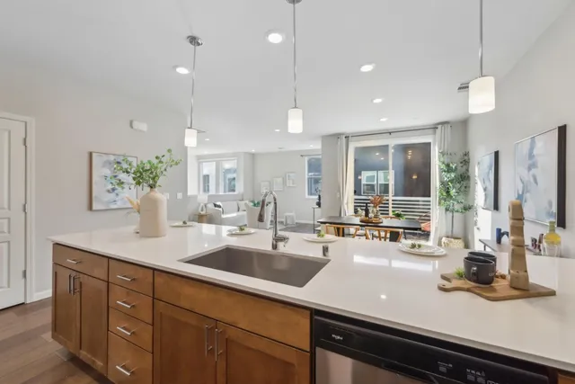 a kitchen with sink and window