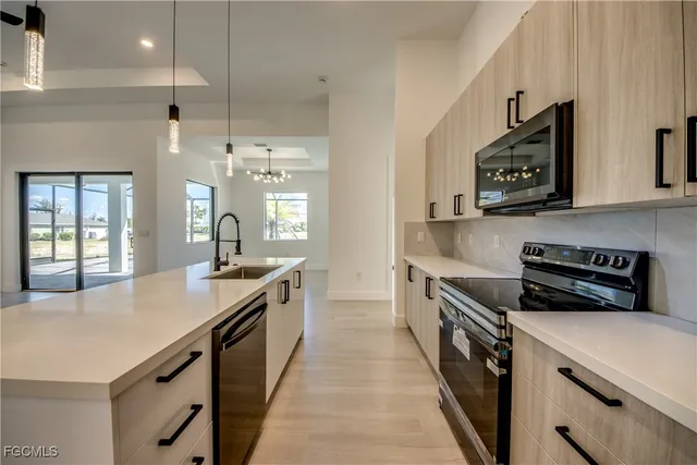 a kitchen with a stove and a microwave