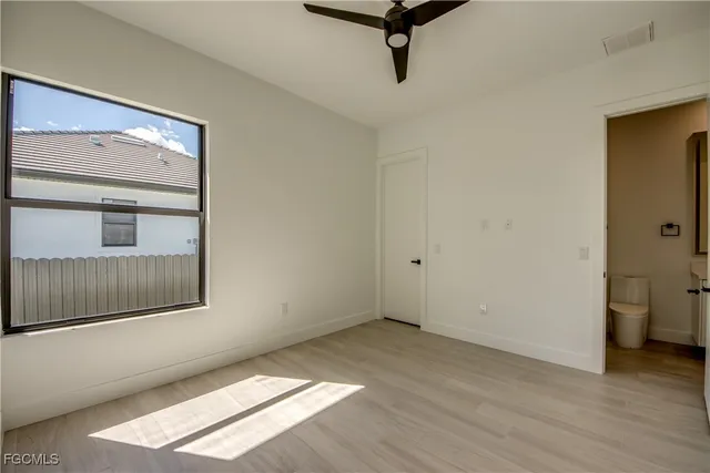 a view of a room with a sink and a window