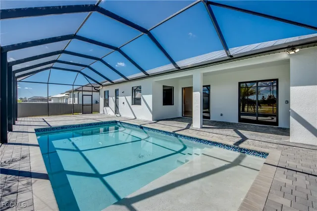 a view of a living room with a large window