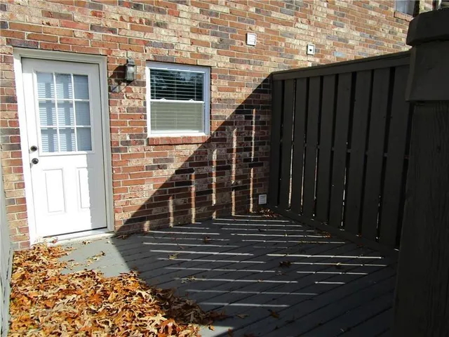 a view of a house with wooden stairs