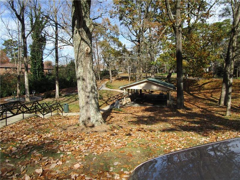 1235 Riverside Drive, Unit F6 Gainesville, GA 30501 - Photo 36 of 38 a view of a yard with plants