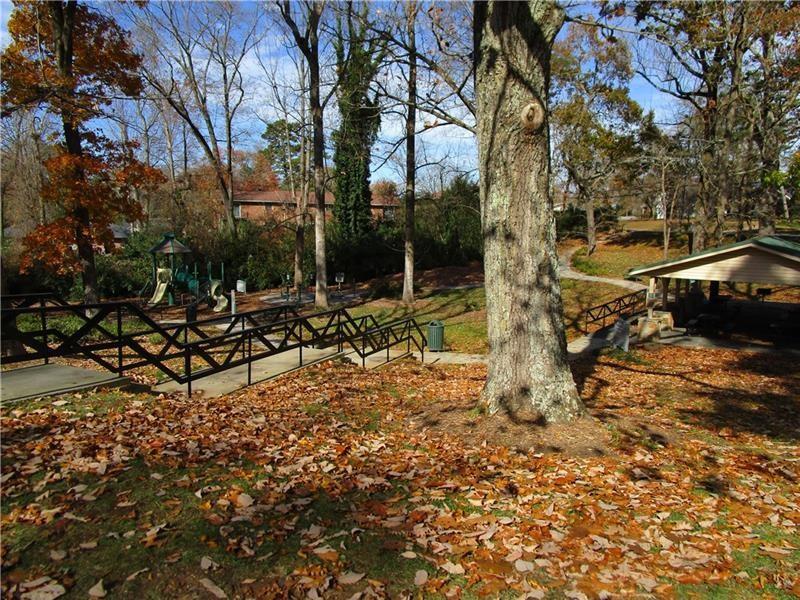 1235 Riverside Drive, Unit F6 Gainesville, GA 30501 - Photo 38 of 38 a backyard of a house with lots of green space