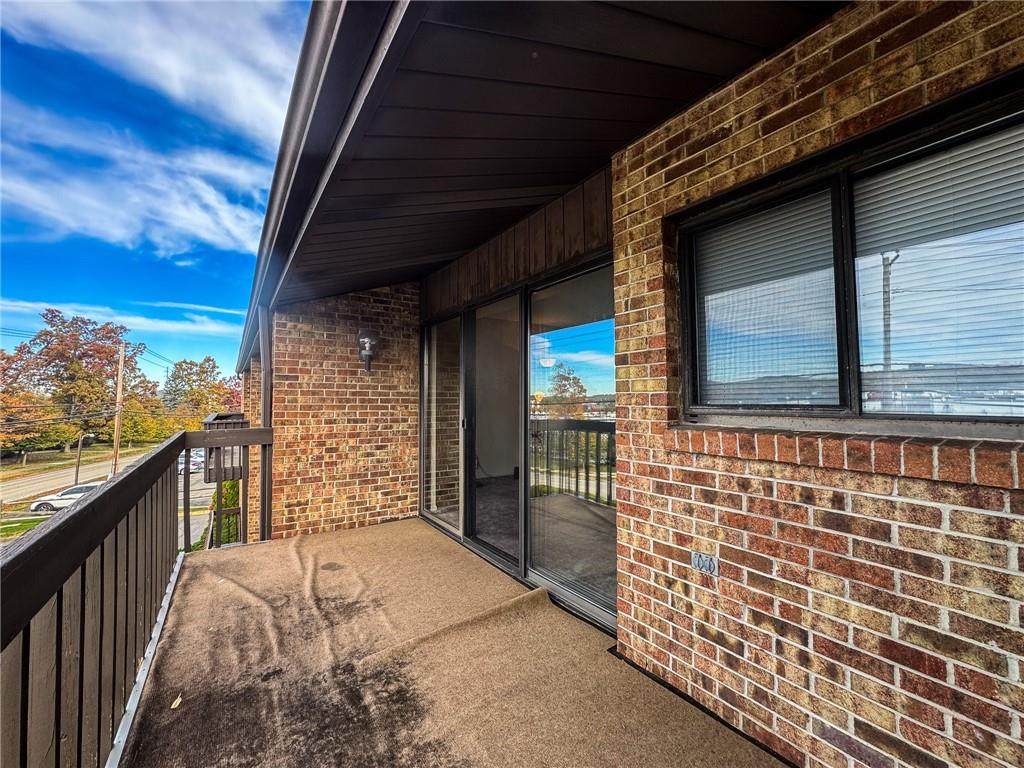 1201 Dutilh Road, Unit 12 Cranberry Township, PA 16066 - Photo 17 of 19 a view of balcony with wooden floor