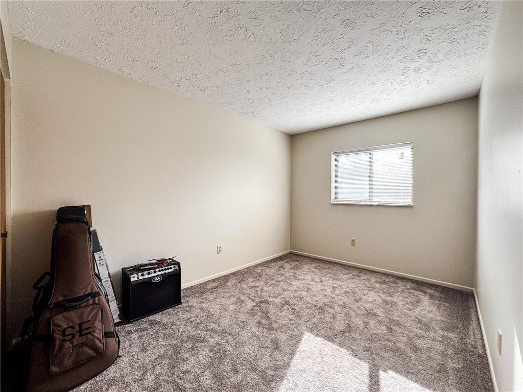 1201 Dutilh Road, Unit 12 Cranberry Township, PA 16066 - Photo 10 of 19 a room with furniture and air hockey table