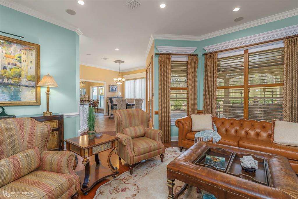 195 Tanglewood Road Homer, LA 71040 - Photo 12 of 37 a living room with furniture and a large window