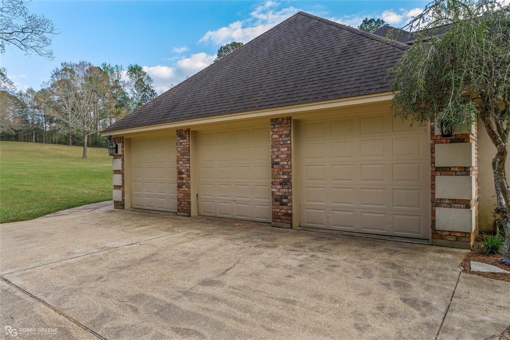 195 Tanglewood Road Homer, LA 71040 - Photo 24 of 37 a backyard of a house