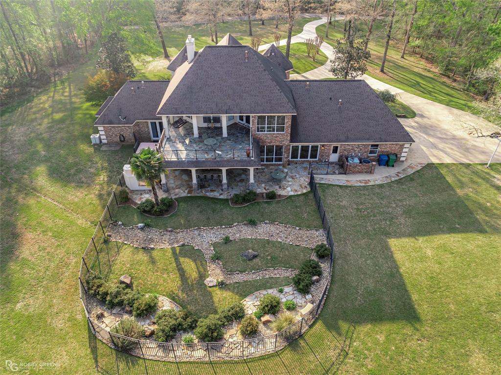 195 Tanglewood Road Homer, LA 71040 - Photo 32 of 37 a aerial view of a house with swimming pool