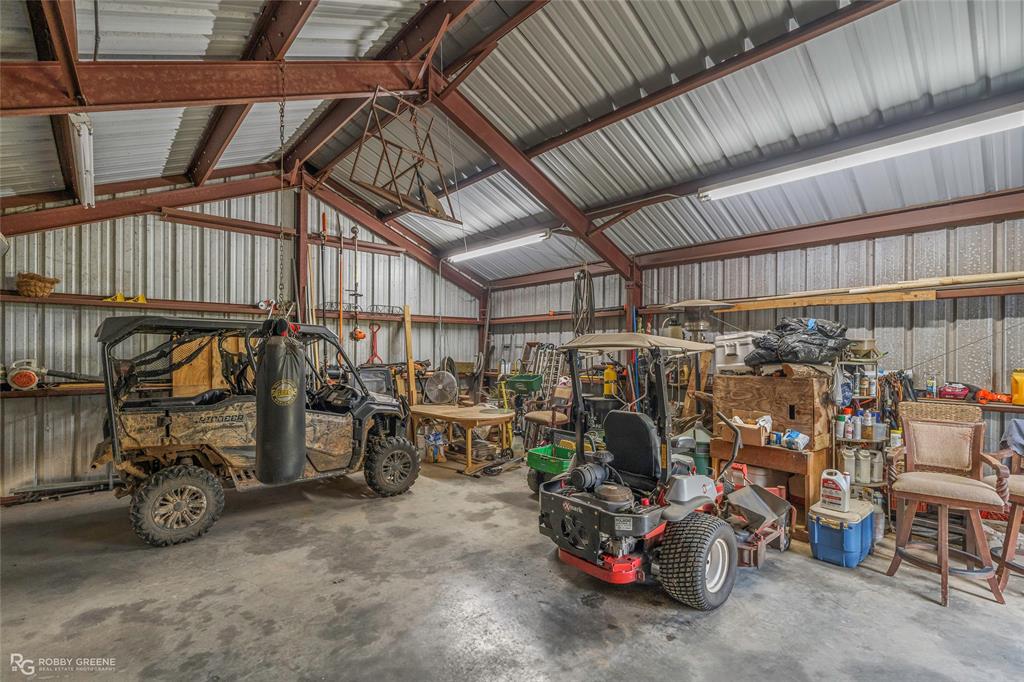 195 Tanglewood Road Homer, LA 71040 - Photo 34 of 37 a view of a storage room with a lot of stuff