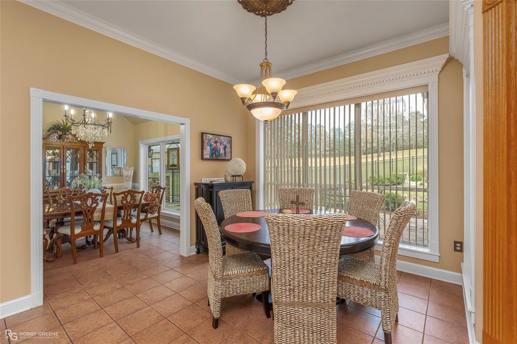 195 Tanglewood Road Homer, LA 71040 - Photo 10 of 37 a view of a dining room with furniture window and outside view