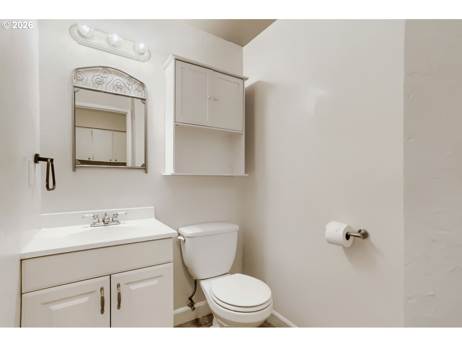 1675 Northeast Juniper Avenue Gresham, OR 97030 - Photo 15 of 29 a bathroom with a toilet sink and mirror