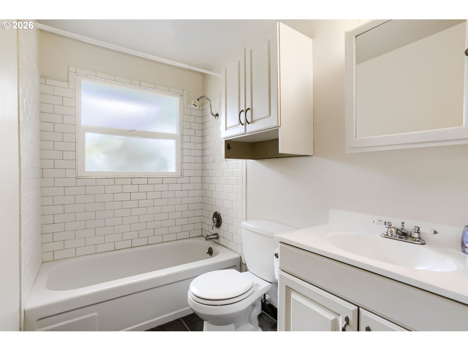 1675 Northeast Juniper Avenue Gresham, OR 97030 - Photo 20 of 29 a bathroom with a sink a toilet and shower