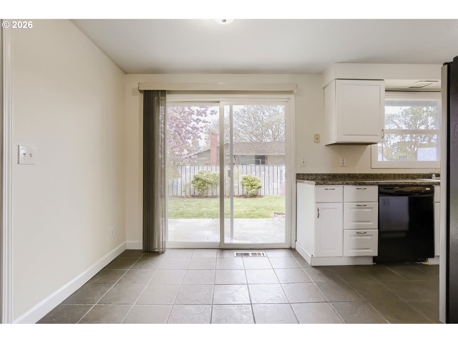 1675 Northeast Juniper Avenue Gresham, OR 97030 - Photo 8 of 29 a kitchen with a stove a sink and a window