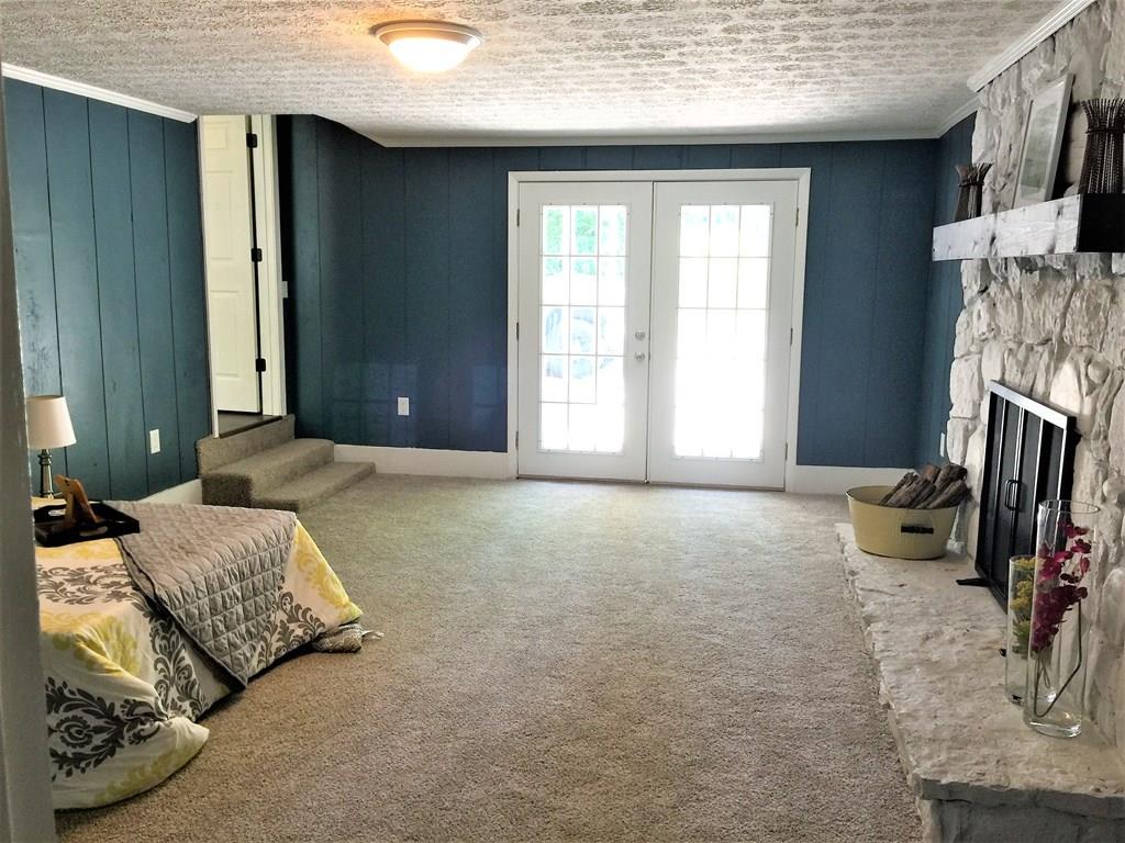 30 Battlefield Road Cookeville, TN 38506 - Photo 6 of 18 Master bedroom with 2 closets and patio doors leading to the back of house.