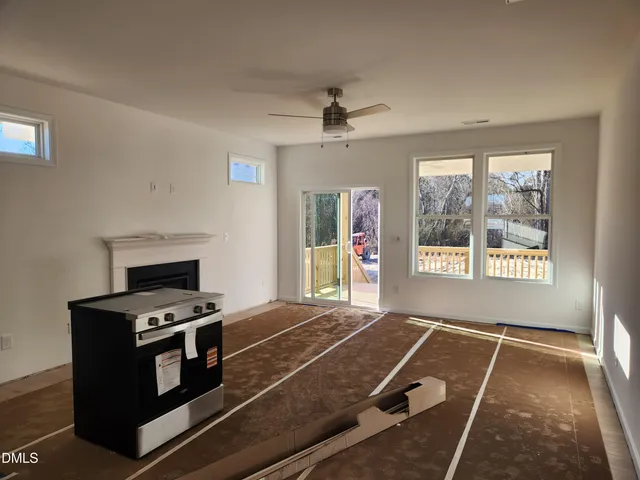 a bedroom with furniture and windows