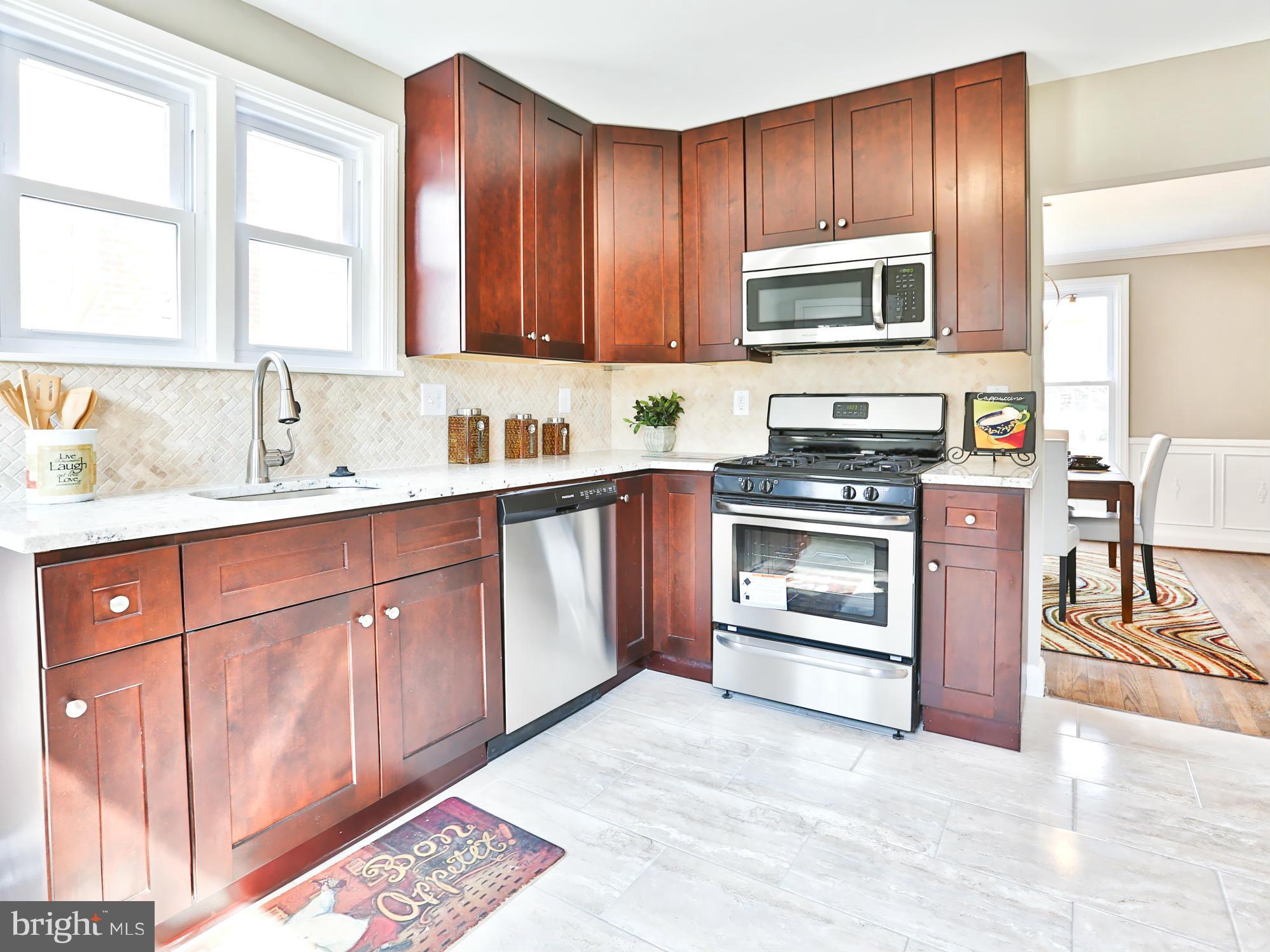 608 Brookwood Road Baltimore, MD 21229 - Photo 5 of 26 Granite Counters and Stainless Steel Appliances