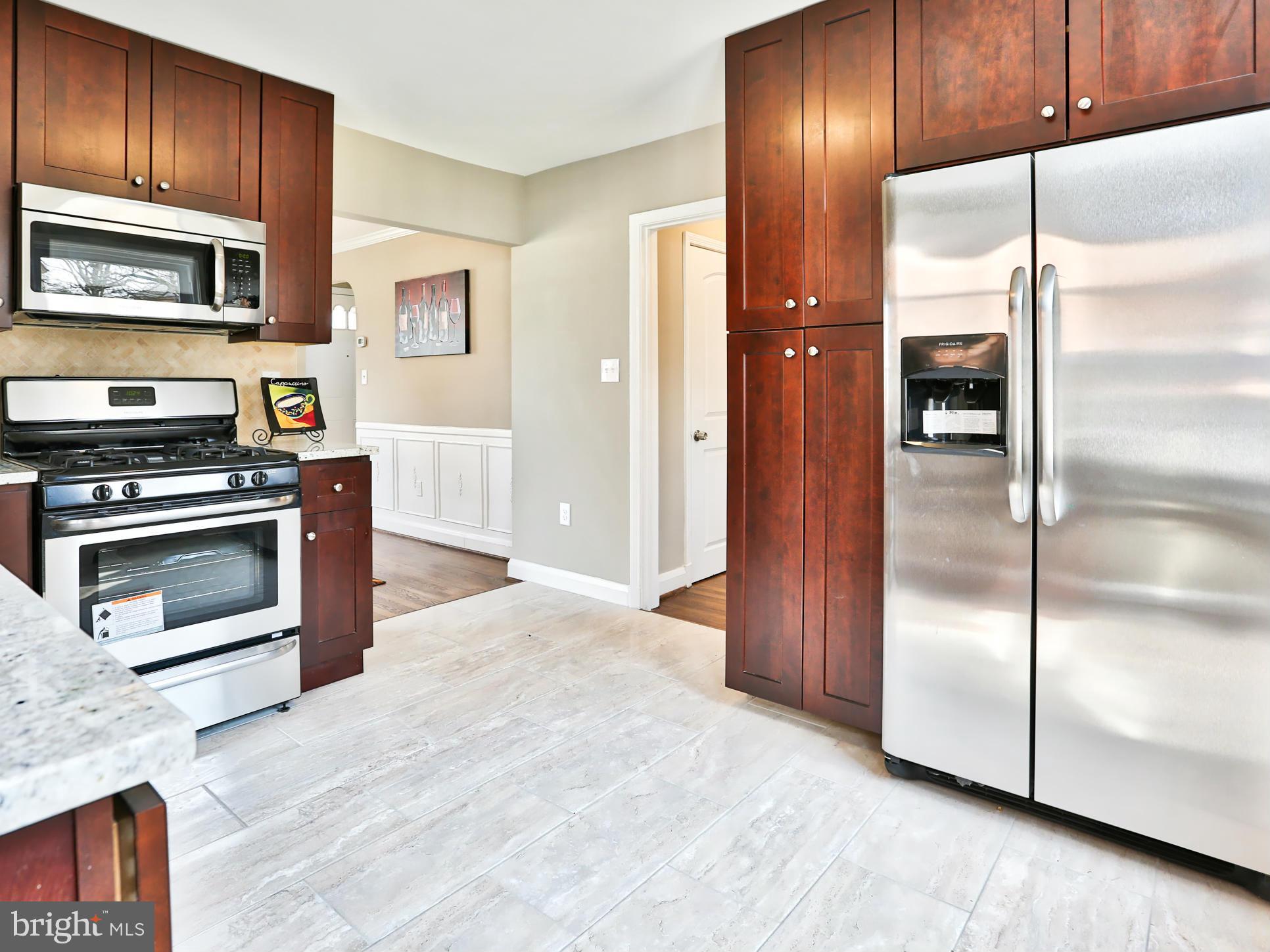 608 Brookwood Road Baltimore, MD 21229 - Photo 6 of 26 Gorgeous Dark Cabinets