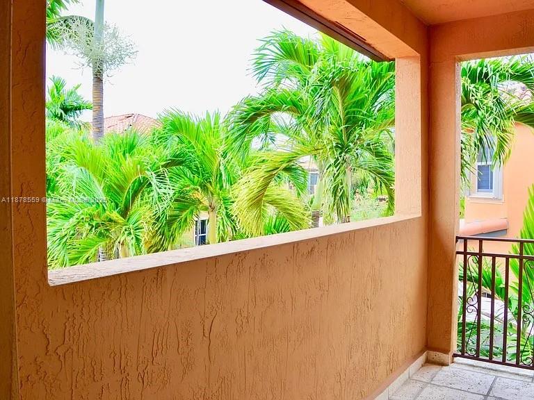 15601 Southwest 31st Lane Miami, FL 33185 - Photo 11 of 18 a view of a garden from a window