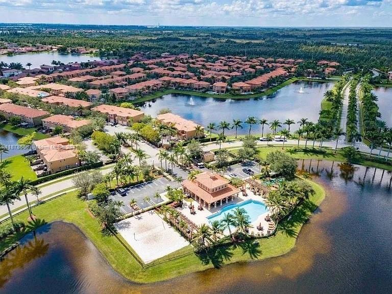 15601 Southwest 31st Lane Miami, FL 33185 - Photo 18 of 18 an aerial view of residential houses with outdoor space and lake view