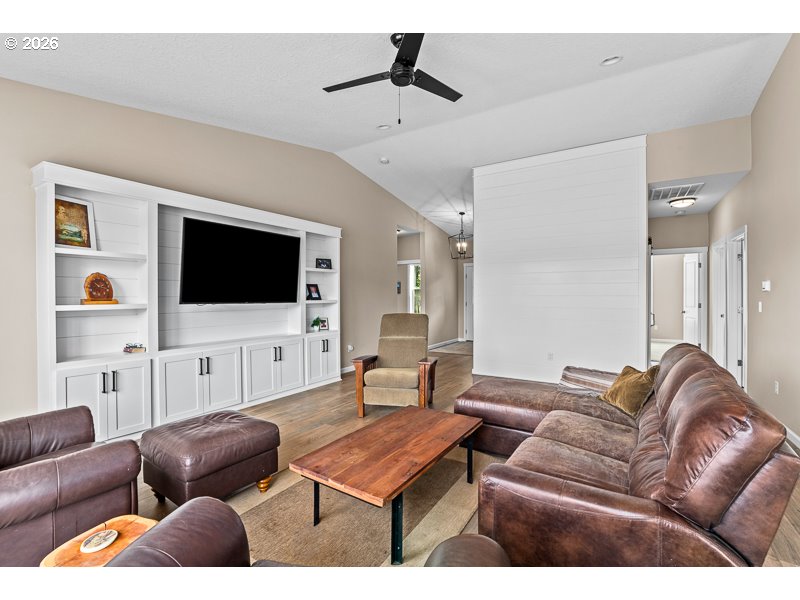 25850 Foster Road Monroe, OR 97456 - Photo 14 of 48 a living room with furniture and a flat screen tv