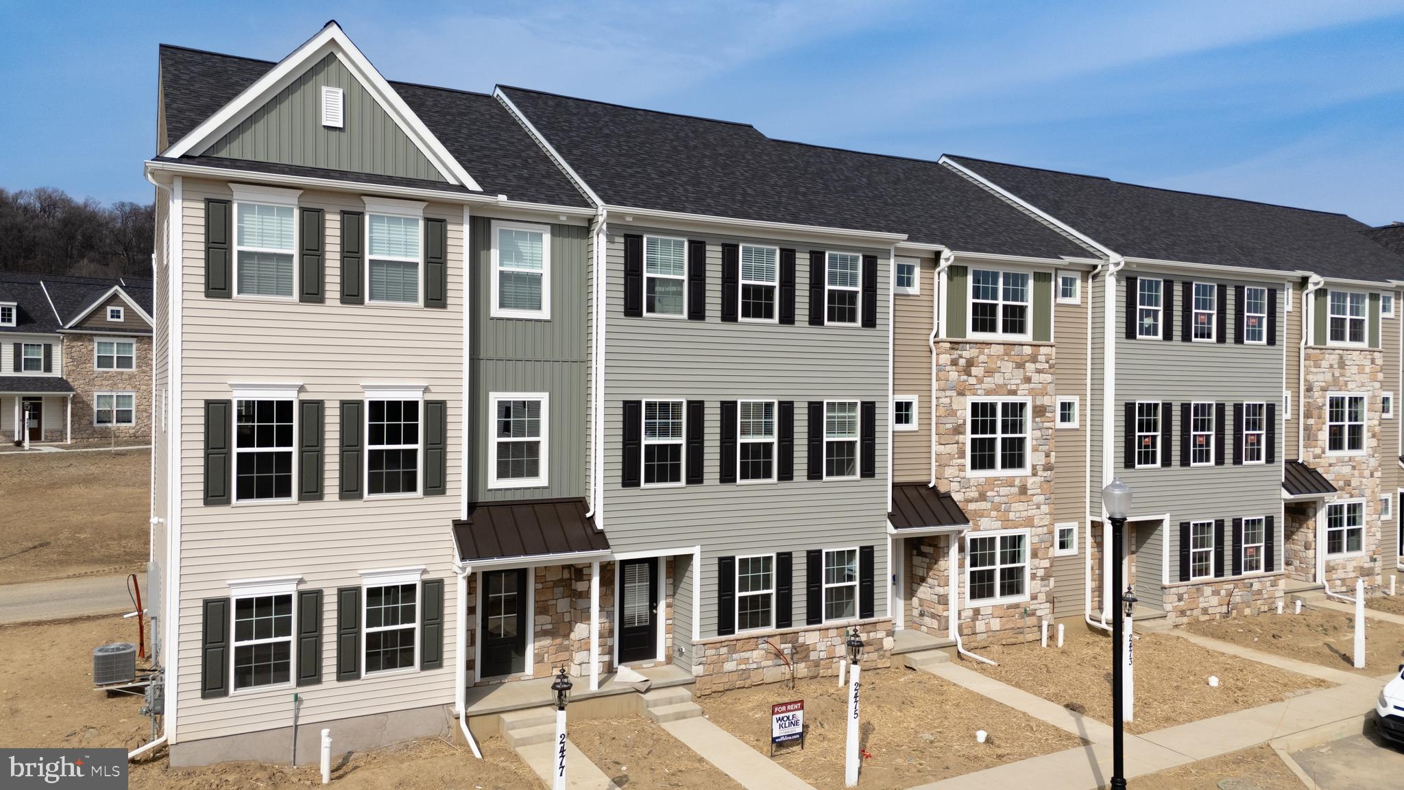 2449 Spring Water Circle Lancaster, PA 17601 - Photo 1 of 1 a front view of a house with a yard