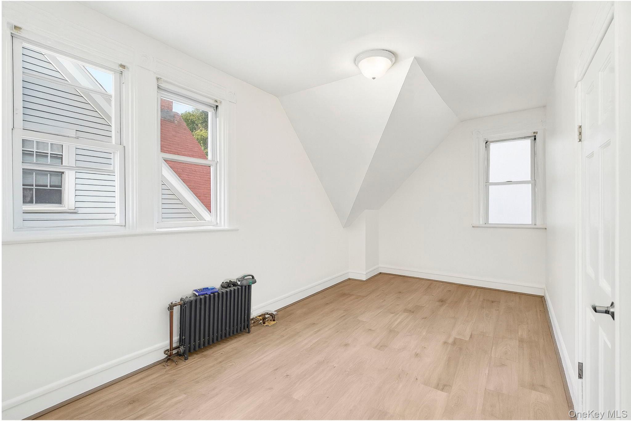 3340 Perry Avenue Bronx, NY 10467 - Photo 17 of 42 an empty room with windows